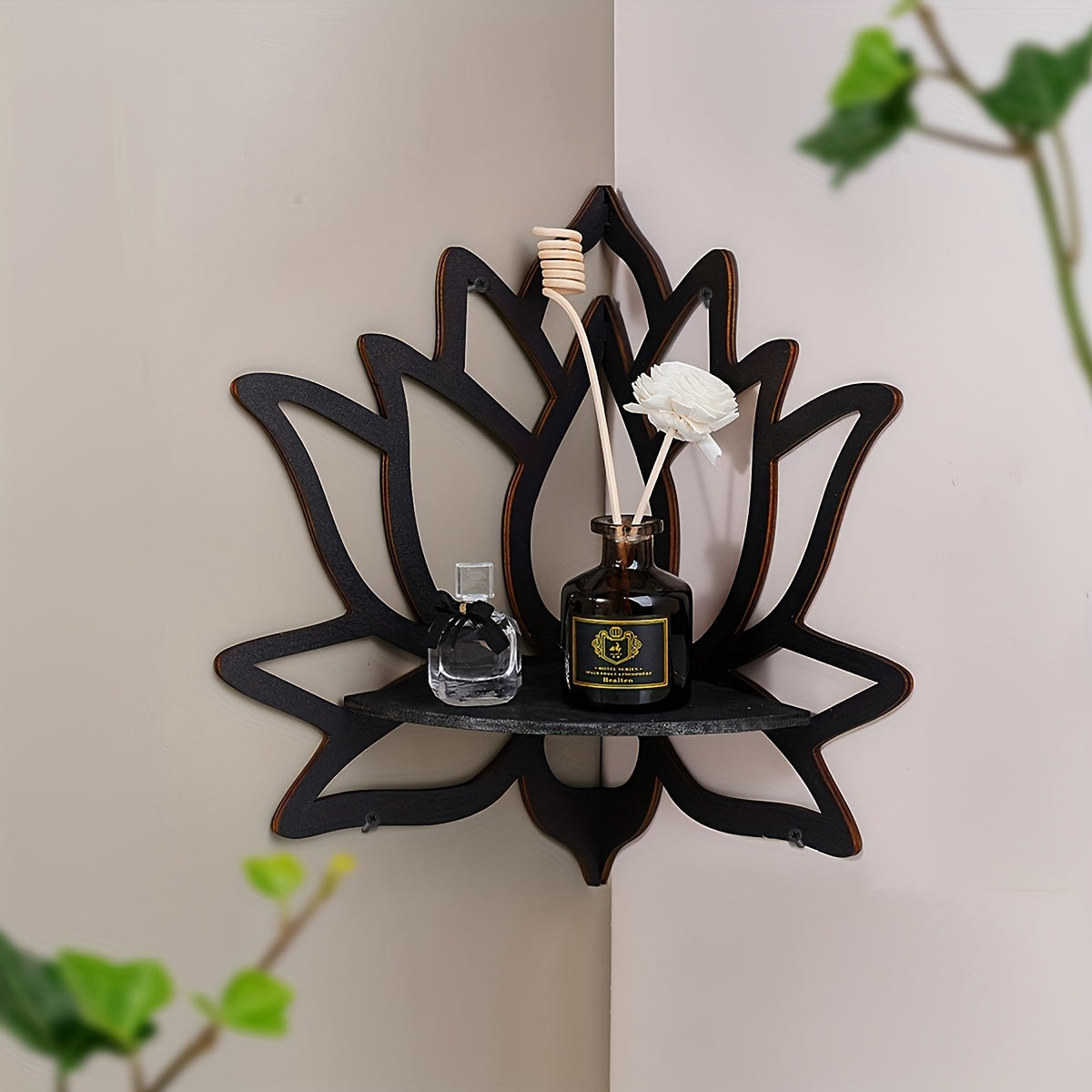 Black wooden wall shelf in the shape of a lotus and butterfly, ideal for displaying candles. Made of manufactured wood, suitable for festive wall decor.