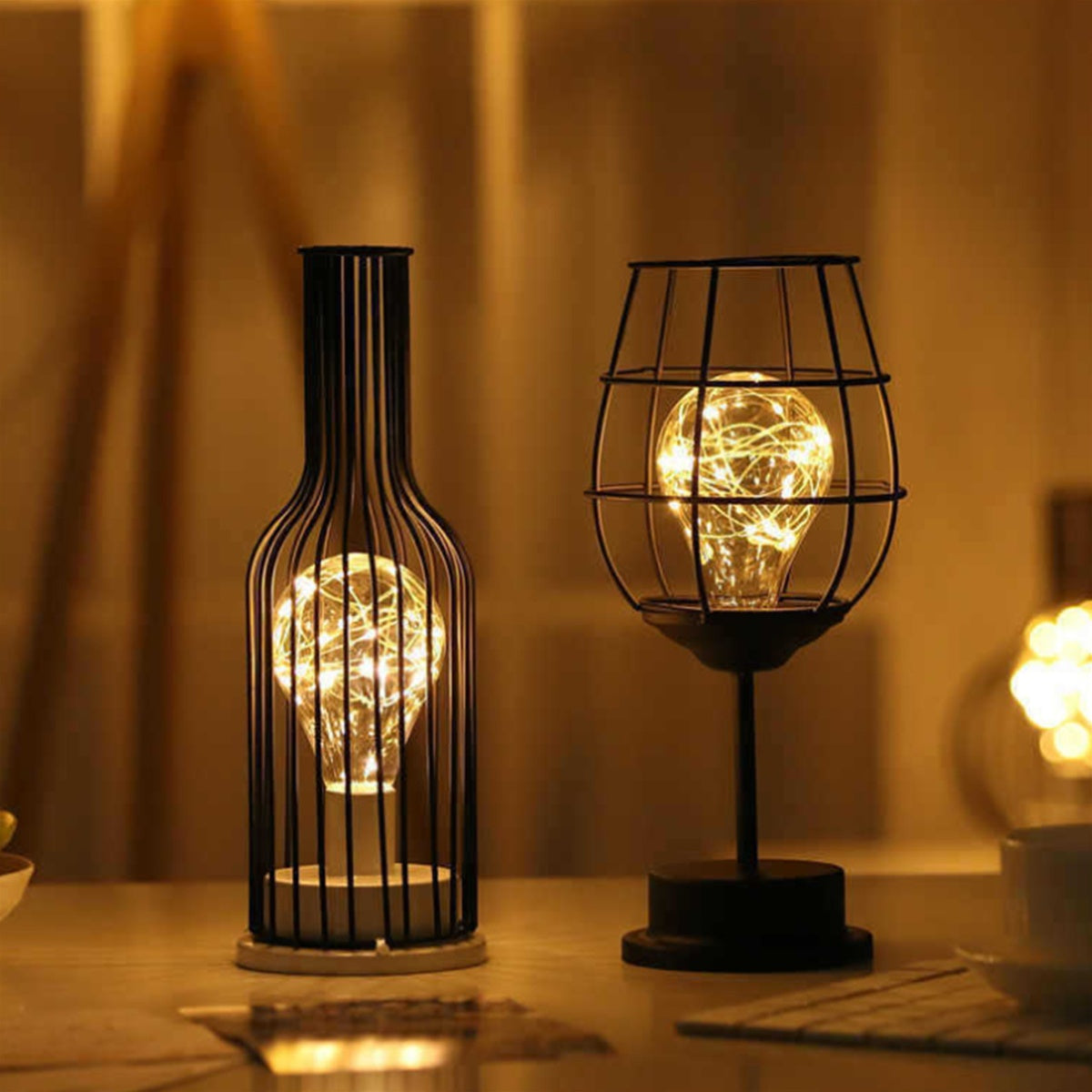 Modern accent light, krlviil Iron Wire Cage Design Night Light is a 0.5W Battery-Powered LED Lamp that provides decorative table lighting for the bedroom or living room. This light fits three AA batteries (batteries not included).