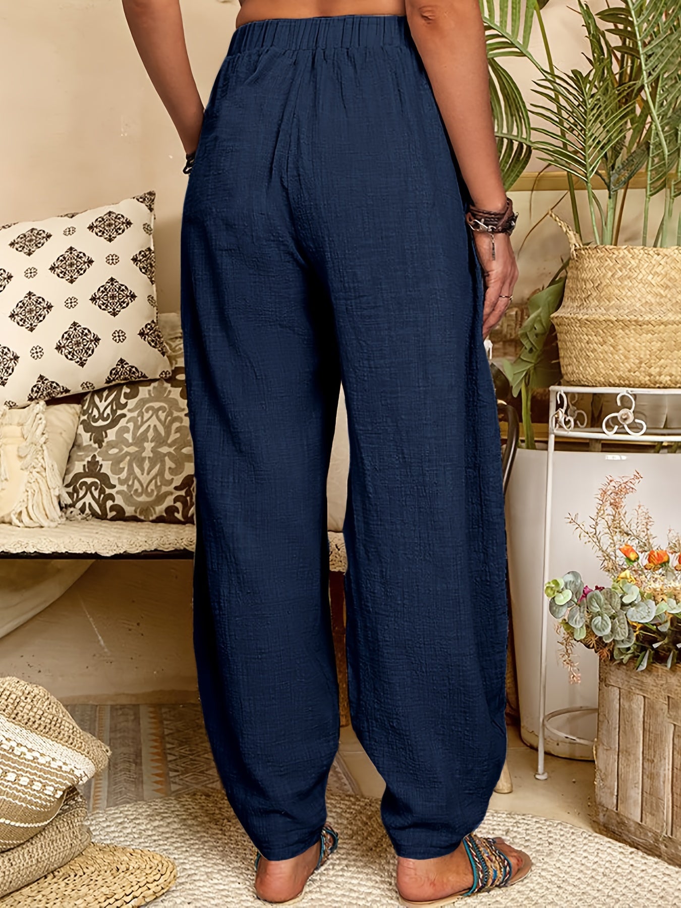 Polyester harem pants with elastic waist, pockets, and machine washable. Suitable for all seasons and plus size.