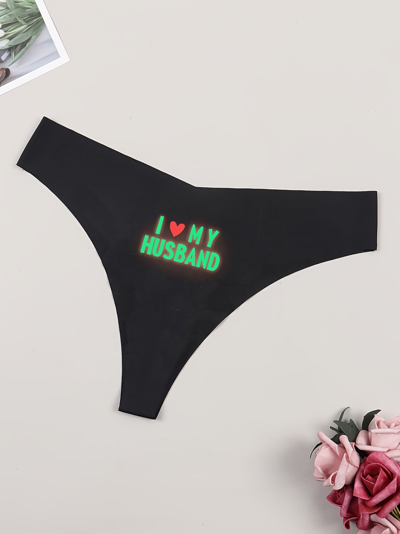 1 piece of women's glow in the dark thong panties made of comfortable polyamide knit fabric.