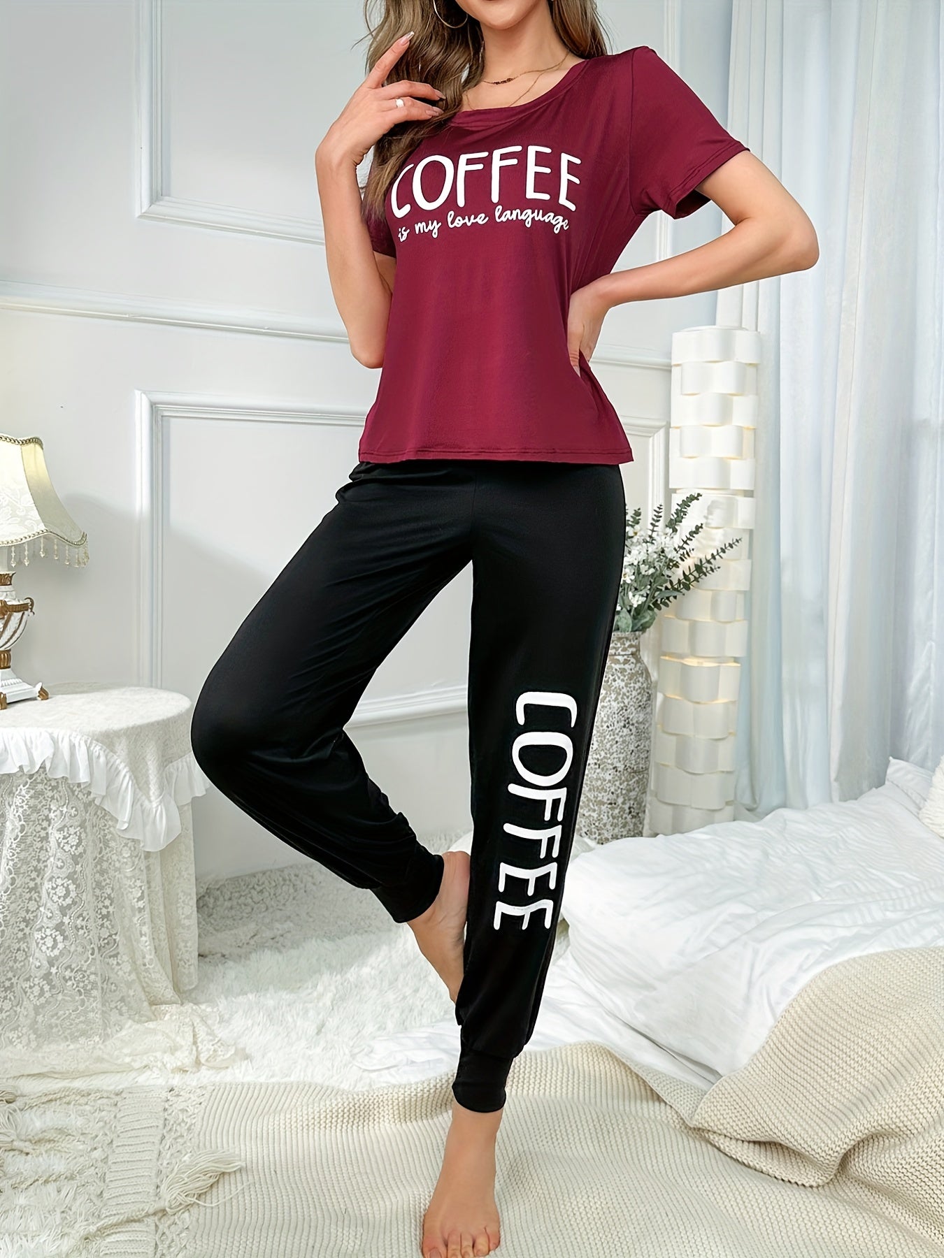 Coffee letter pattern lounge set: short sleeve top and elastic pants for women's sleep and lounge comfort.