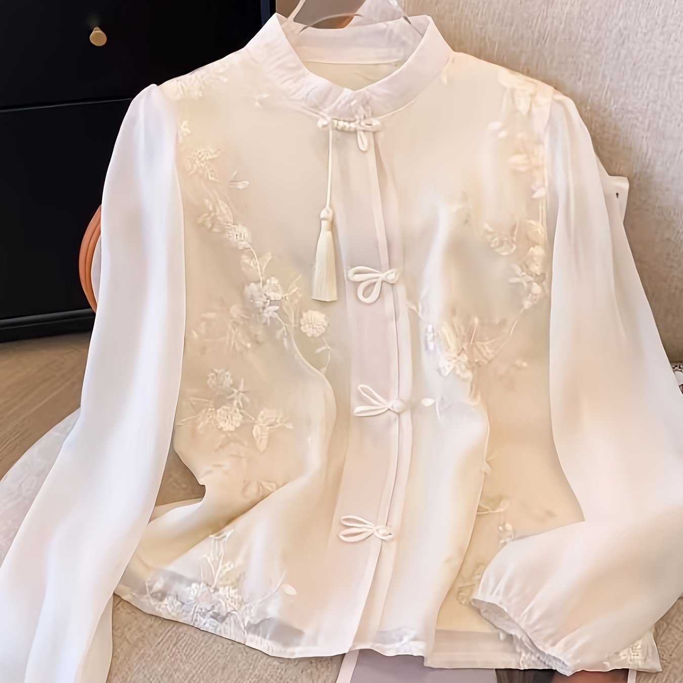 Women's embroidered long sleeve blouse with stand collar, made of 100% polyester woven shirting fabric. Lightweight at 100g/m², ideal for spring/summer fashion in a young style.