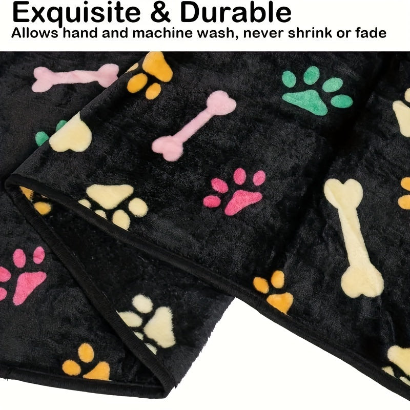 Stain-resistant fleece pet blanket with bone pattern, machine washable for dogs and cats, suitable for small to large breeds.