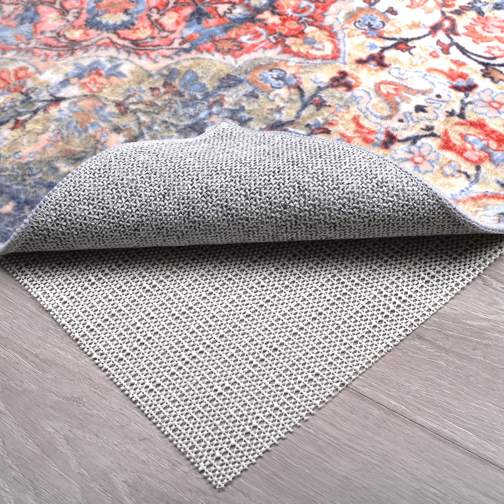 Enhance home comfort and safety with our durable beige non-slip rug pads. Perfect for hardwood floors, these PVC gripper mats keep your area rugs in place and protect against slipping. Keep your rugs safe and secure with our anti-skid pads.