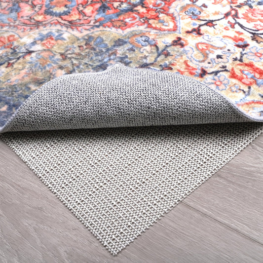 Enhance home comfort and safety with our durable beige non-slip rug pads. Perfect for hardwood floors, these PVC gripper mats keep your area rugs in place and protect against slipping. Keep your rugs safe and secure with our anti-skid pads.