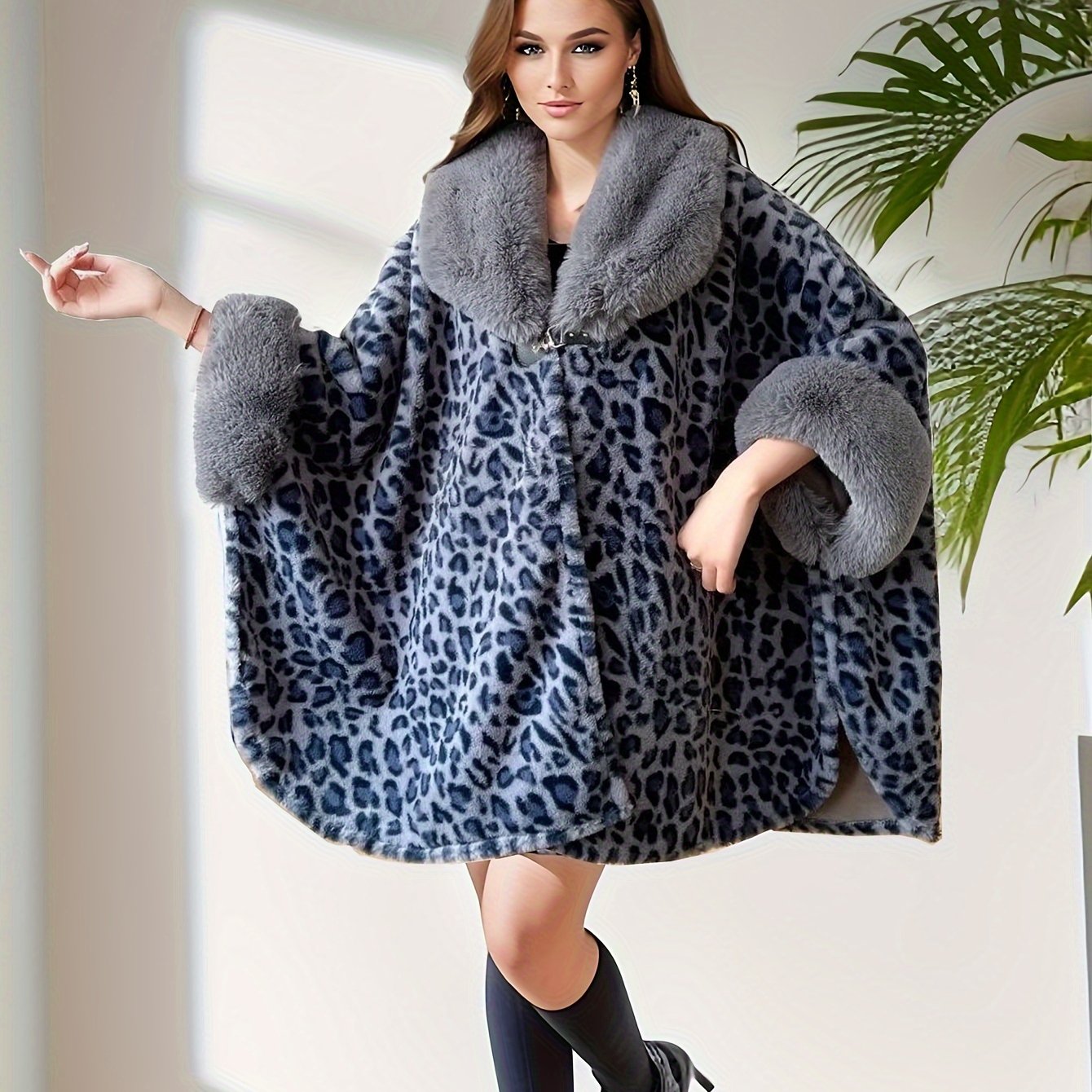 Thick faux fur bat style cardigan with animal print.