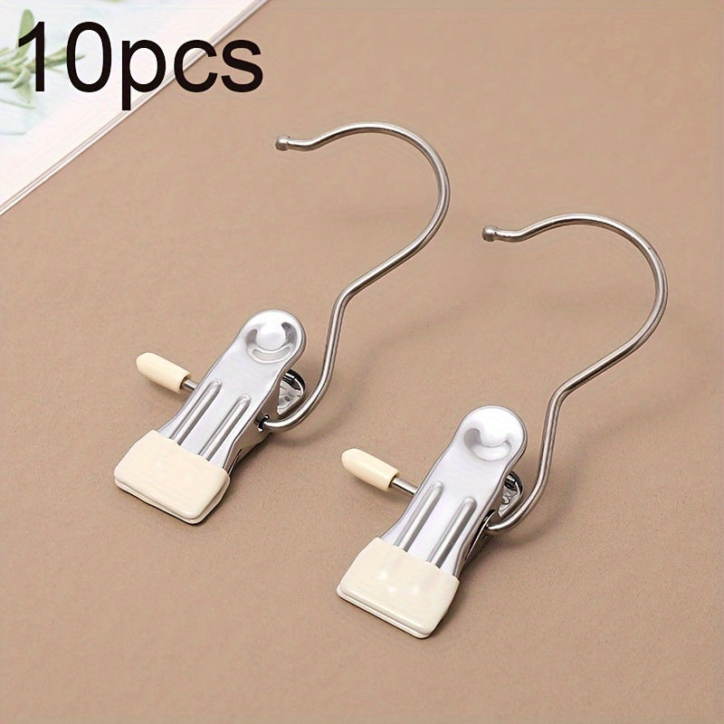 Set of 10 stainless steel laundry clips with swivel hook, versatile windproof clothes pegs for hanging socks, underwear, and accessories, efficient wardrobe organizer clips for saving space, and holding clothes securely.