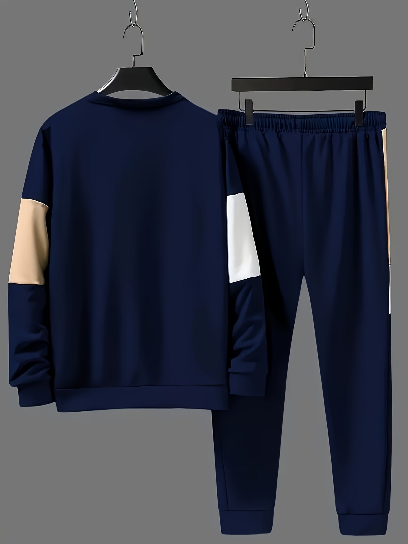 Men's clothing set includes round neck top and drawstring sweatpants.