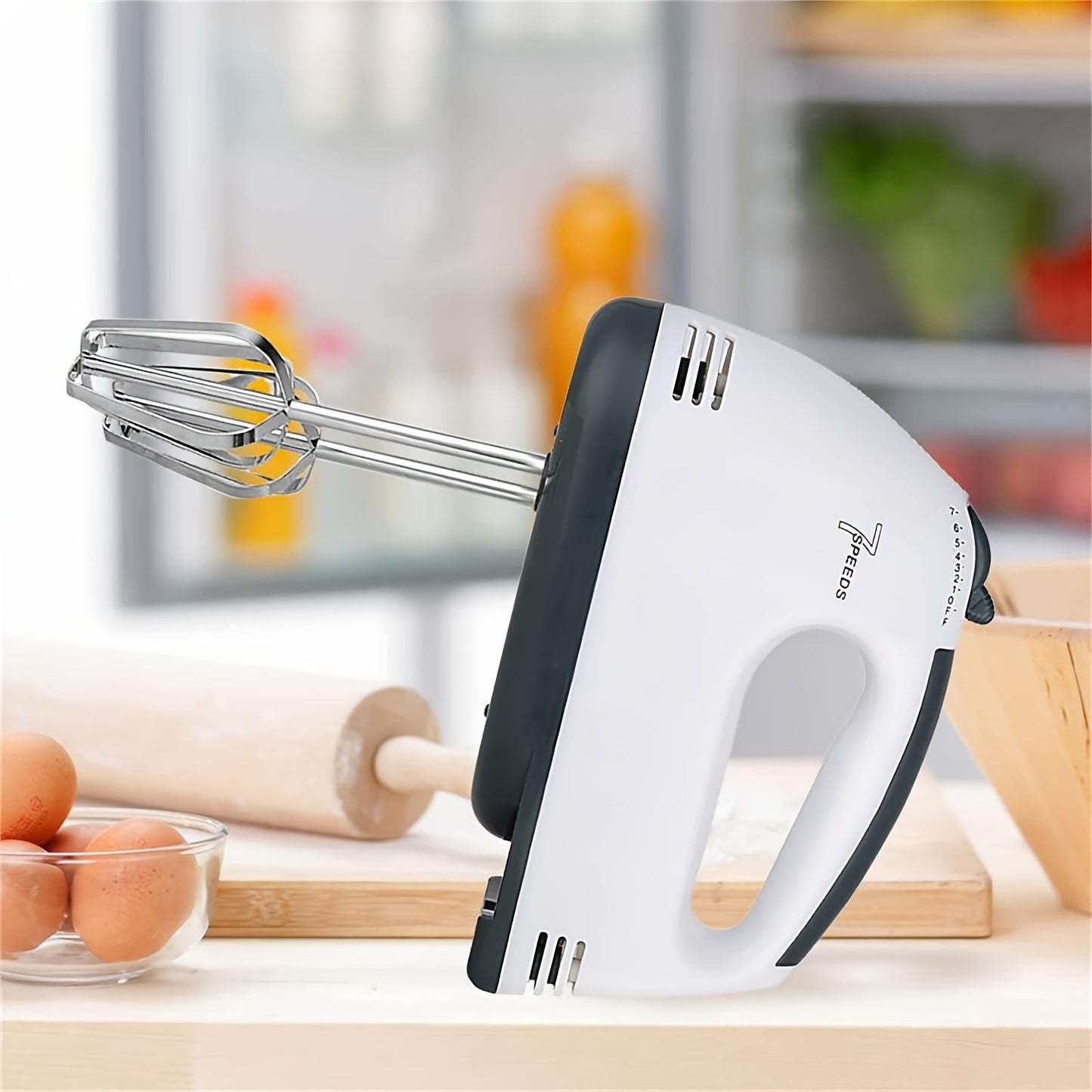 Upgraded electric egg beater with 7 speeds for home baking, featuring a powerful 15W motor. Ideal for beating eggs and whipping cream (#5415).