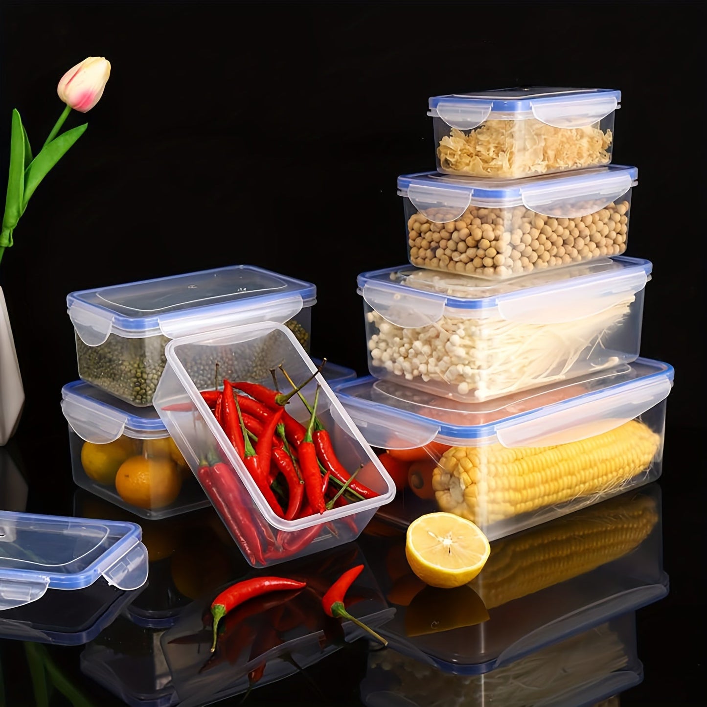 Transparent plastic food storage box with moisture-proof and airtight seal, ideal for storing grains and other foods in the kitchen refrigerator. This large container is microwave safe and thickened for durability, making it a must-have accessory for