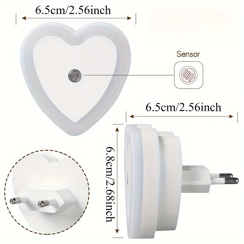 Heart-shaped LED night light with built-in sensor and European plug for indoor use. Ideal for stairways, bedrooms, kitchens, and hallways. Not waterproof. Can be wall-mounted.