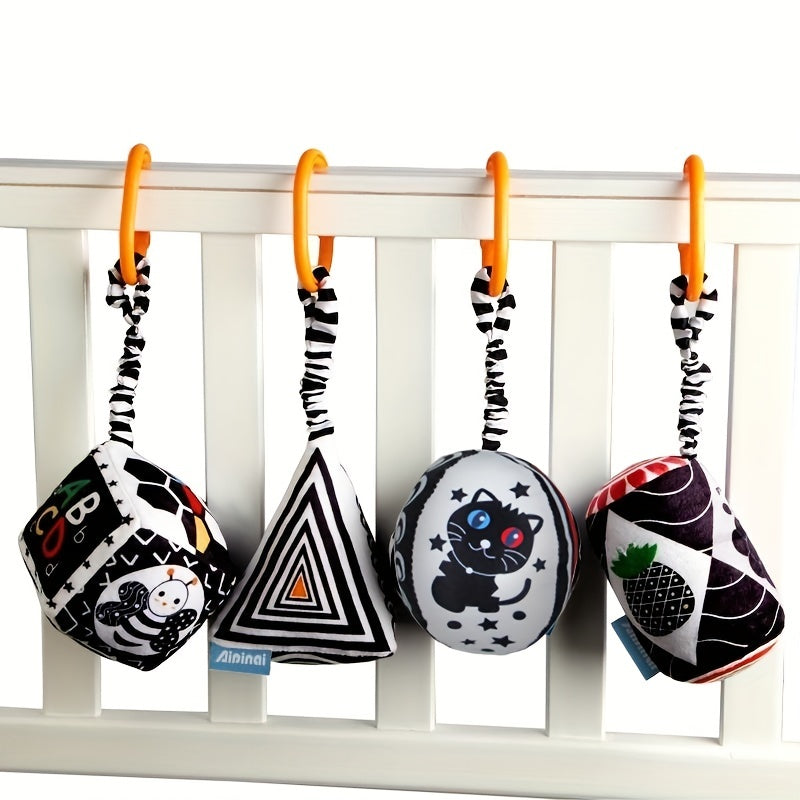 Geometric-shaped black and white hanging toys for babies, designed for early education and visual stimulation. Perfect for attaching to strollers, car seats, or hanging over baby's bed.