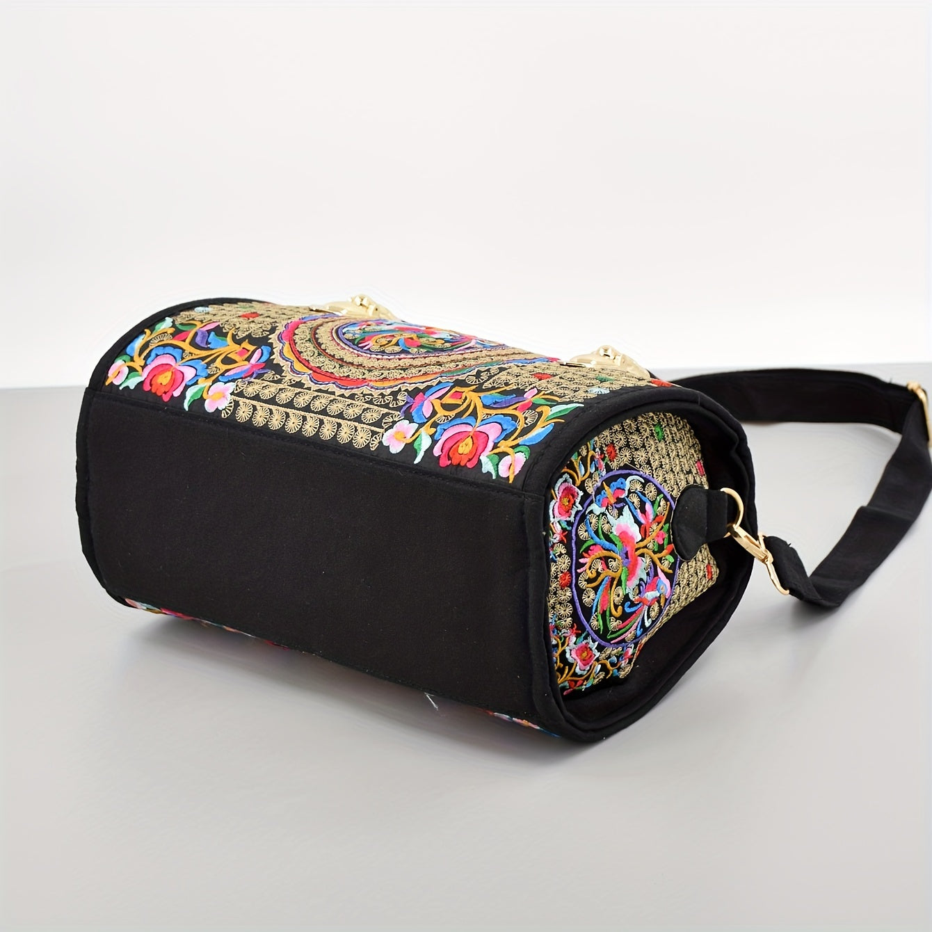 Vintage embroidered Boston bag with retro bohemian tote style for women.