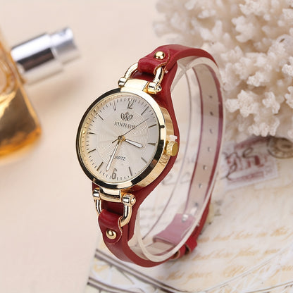 1 elegant women's quartz watch with black faux leather strap and golden-tone accents - fashionable analog display, battery operated, perfect for everyday and special occasions.