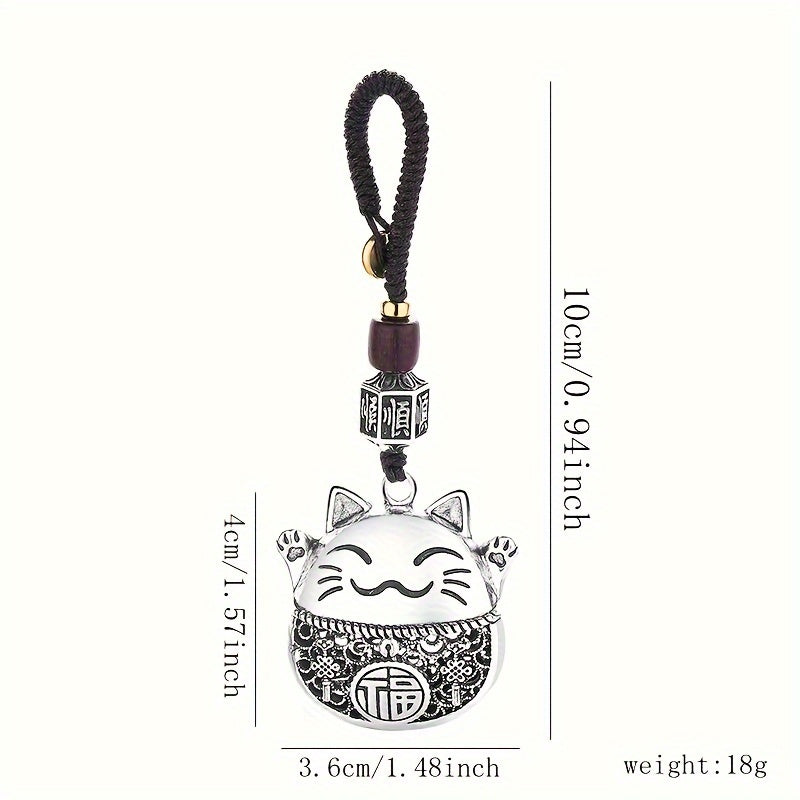 Essential accessories for both men and women with a minimalist ethnic design, including a Chinese-inspired lucky cat and copper coins to bring in prosperity, along with a whimsical cartoon cat pendant specially for the ladies.