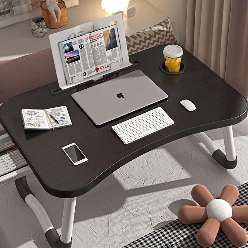 Large portable laptop desk with folding design, featuring multifunctional tray, cup holder, drawer, USB port, fan, and light. Made of durable aluminum alloy, suitable for use on bed, sofa