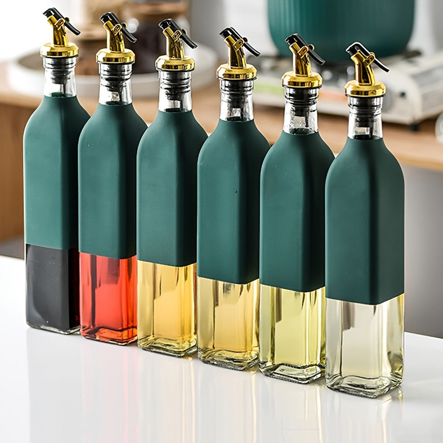 Set of glass dispenser bottles for olive oil and vinegar with a golden pour spout. Hand wash only, PVC free. Includes 6 rectangular cruets with a storage holder rack.