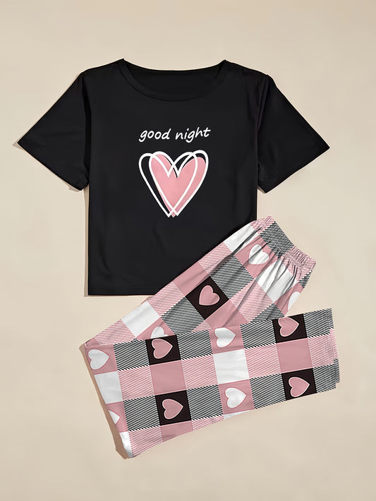 Women's heart graphic t-shirt and plaid pants set in casual polyester knit, featuring a short sleeve top with crew neck and elastic waist lounge pants. Perfect for lounging or sleepwear.