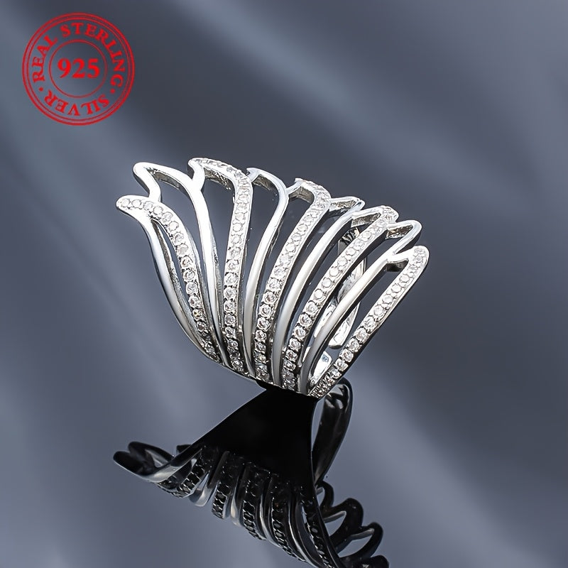 This elegant ring for women exudes a touch of luxury, featuring intricate angel wings with sparkling synthetic zirconia. Made of lightweight silver weighing 6 grams, this open ring is perfect for daily wear, special occasions, and weddings.