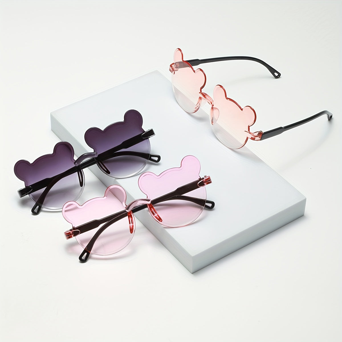 New bear decorative glasses set includes 3 pieces with a cartoon frameless design and bear-style gradient lenses.