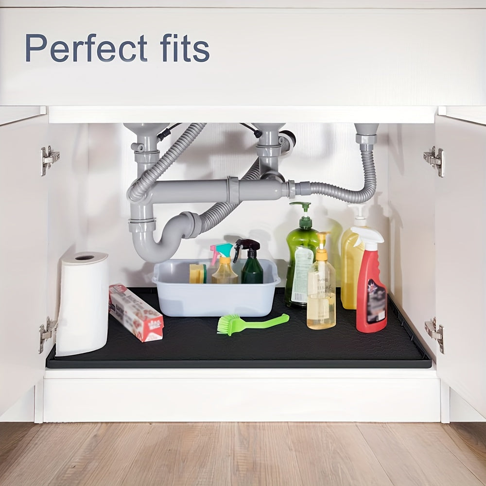 Essential kitchen organization accessory - Waterproof and anti-drip liner for kitchen and bathroom cabinets, measuring 71.12x48.26 cm - Flexible silicone under sink mat.