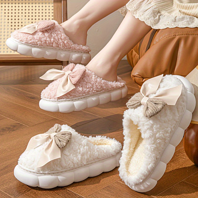 Women's winter warm plush slippers with bowknot detail and non-slip sole, perfect for autumn/winter indoor wear.