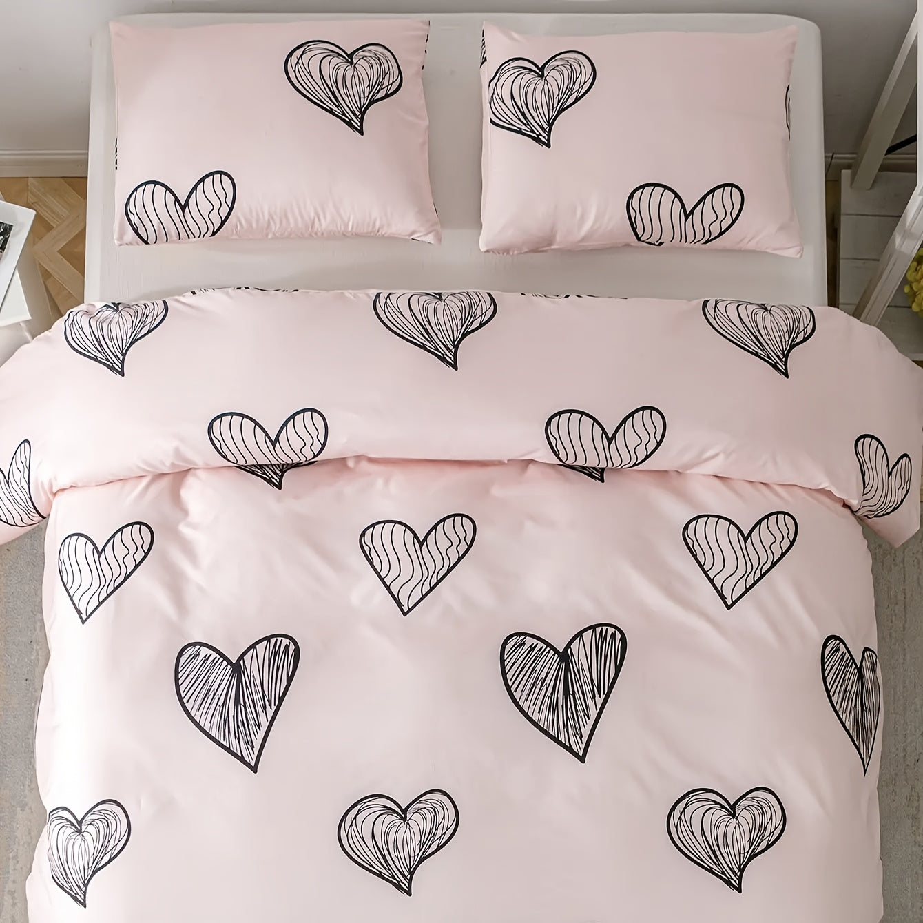 Get two soft and breathable pillowcases in a pink heart pattern with an envelope closure. Made of polyester, these pillowcases are machine washable and feature active printing. At 90gsm, they are the ideal gift for both men and women. Use them as pillow