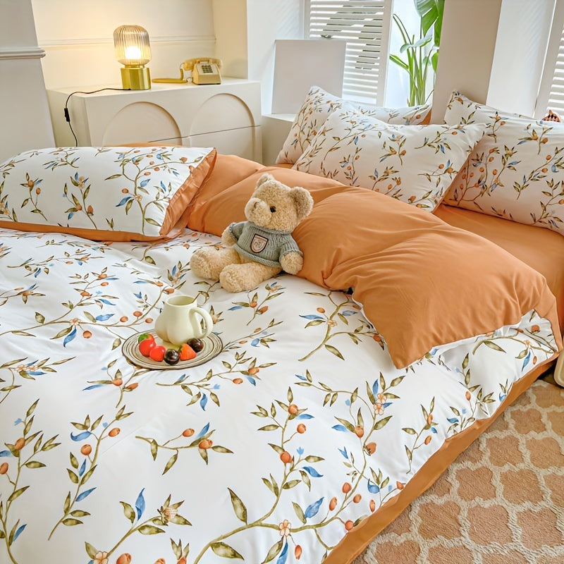 Orange flower and fruit plant pattern quilt cover set includes 1 quilt cover and 2 pillowcases in a pastoral style. Made from comfortable and skin-friendly material, it is non-ball and can be machine washed. Available in single, double, standard, and