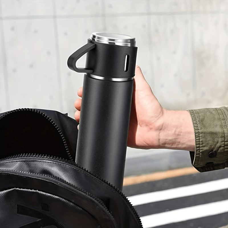 Stainless steel vacuum flask set with integrated cup, leakproof design, ideal for hot and cold beverages on the go.