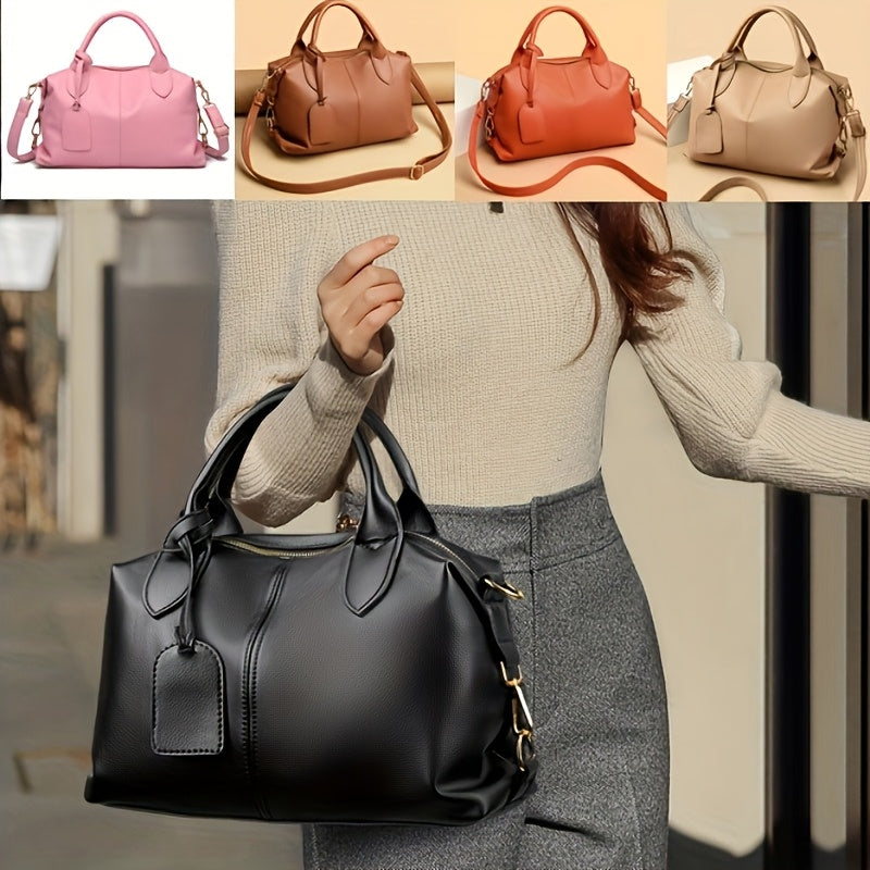 Boston style synthetic leather tote bag with zipper closure, polyester lining, and edge paint detail. Comes in Black, Pink, Khaki, Orange, and Light Brown.