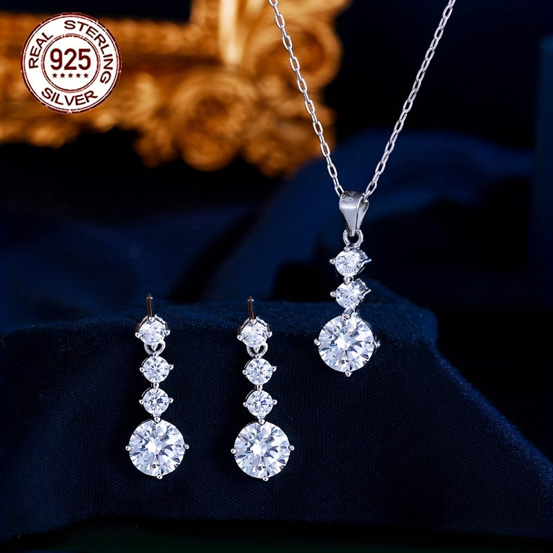 One set of elegant 925 sterling silver jewelry featuring classic 4-roundel drop earrings and pendant necklace with synthetic cubic zirconia. Perfect for daily wear or as a gift for Valentine's Day for women. Silver plated for added shine.