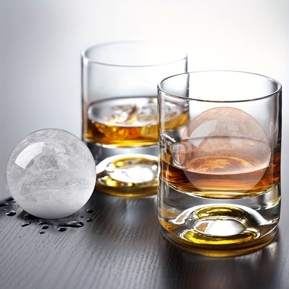 Large ice sphere molds made from silicone and polycarbonate with dual-function funnel lid for slow-melting ice balls. Perfect for bourbon and beverages at the bar.