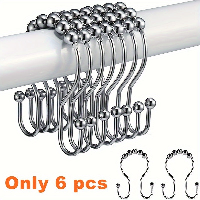 Set of 6 stainless steel shower hooks with double glide design for easy opening and closing, compatible with most rods and liners.