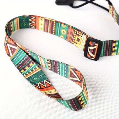 Colorful Hawaiian-inspired ukulele strap with geometric patterns, vibrant mixed colors, and a 4-string guitar hook backdrop.