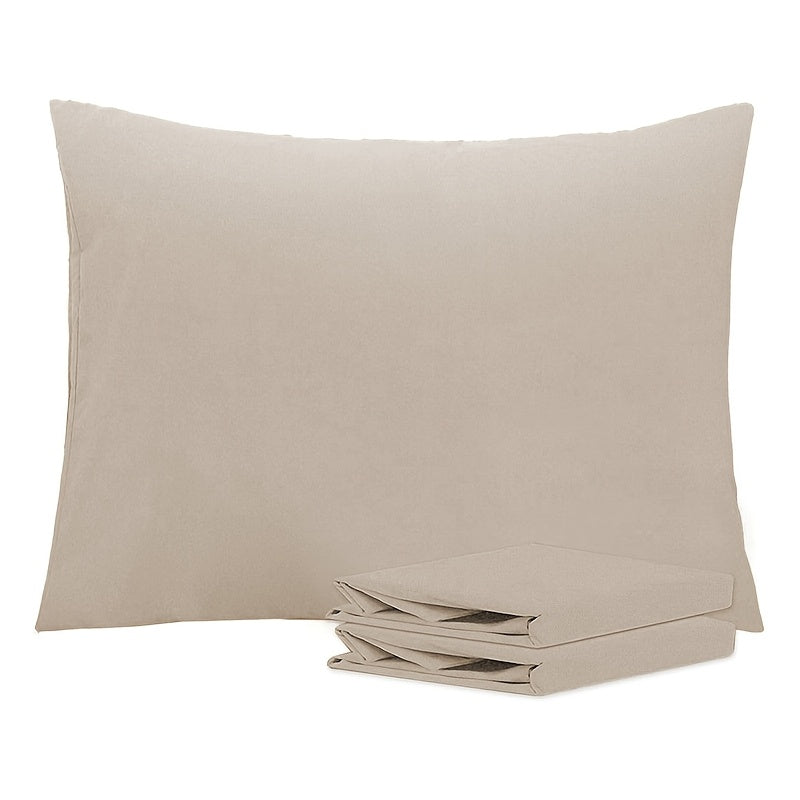 Get two sets of white pillowcases that are perfect for families, hotels, and apartments. These pillowcases provide a comfortable experience with their soft and breathable material. Made of high-quality fabric, they are suitable for bedroom, sofa, and