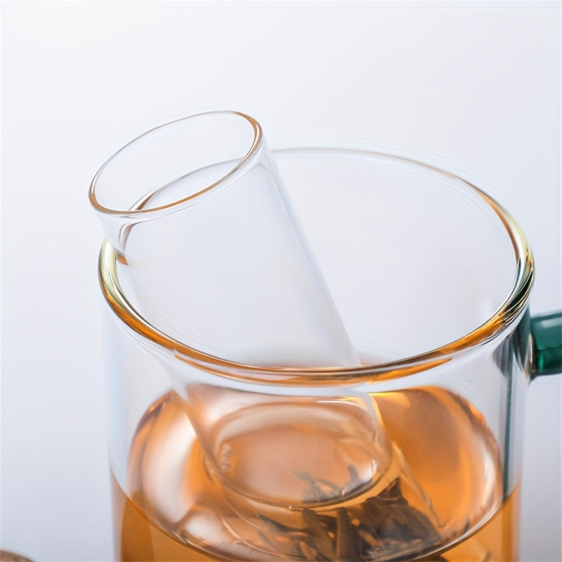 Glass tea infuser with cork lid that is easy to use and perfect for brewing loose leaf and herbal tea. Features a transparent test tube design, ideal for use in the office, camping, or home kitchen. A must-have tea accessory.