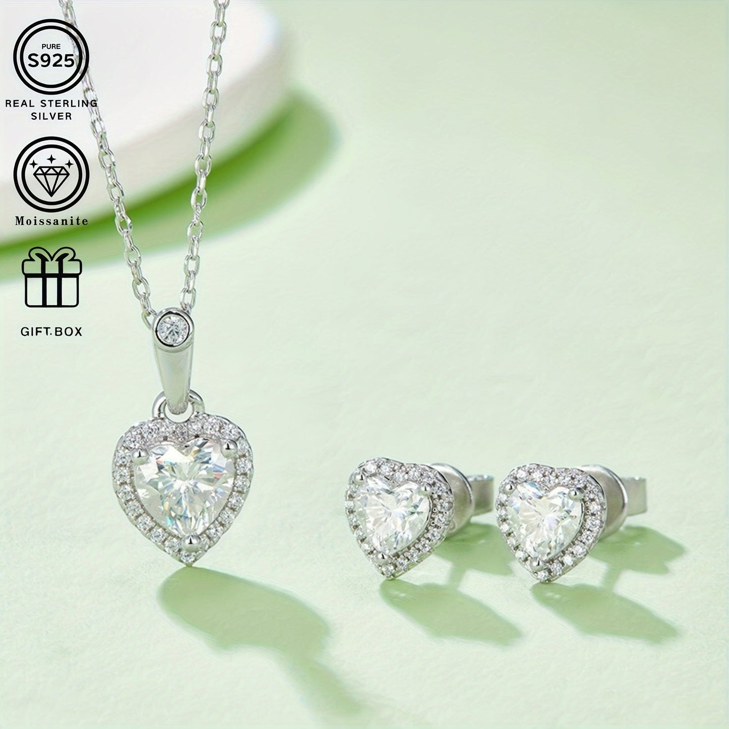 These elegant and luxurious S925 Silver Light Luxury Heart Platinum-Plated 2 Carat Moissanite Pendant Earrings are perfect for daily wear or special occasions. With a total weight of approximately 2.88g/1.58g, these earrings make a beautiful gift for