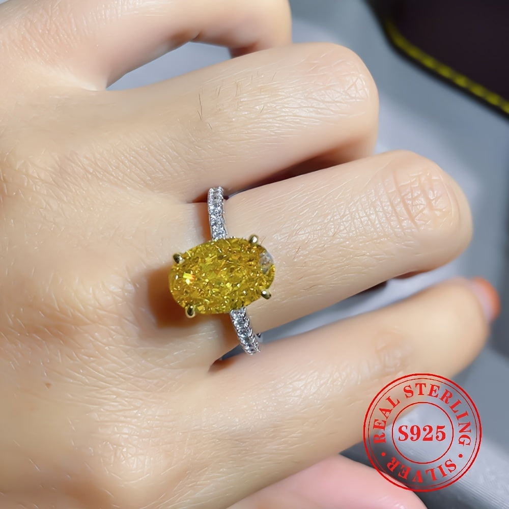 Sleek and stylish S925 sterling silver ring featuring a stunning large yellow oval-cut cubic zirconia stone. This AAA grade zirconia engagement ring is perfect for women and is gift-ready for special occasions such as banquets and Thanksgiving. Versatile