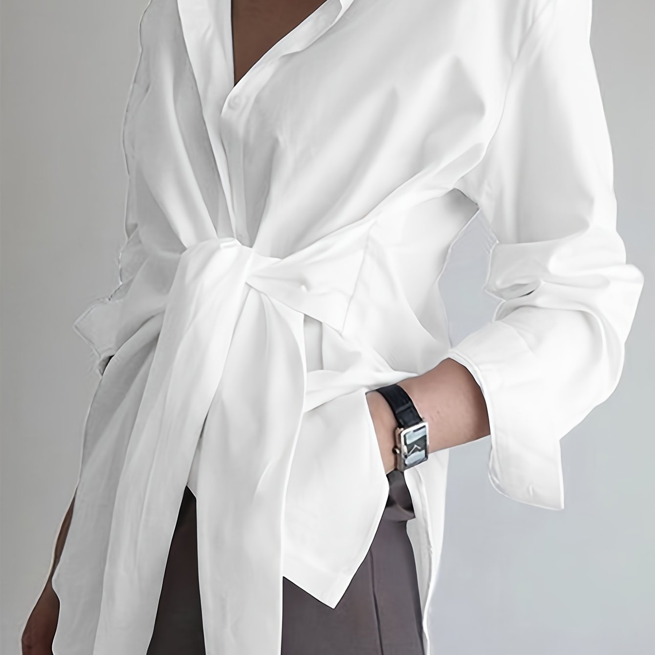 Lapel collar women's shirt made of 100% polyester with long sleeves and button front. All-season woven fabric, 117 gsm weight - versatile for adults.