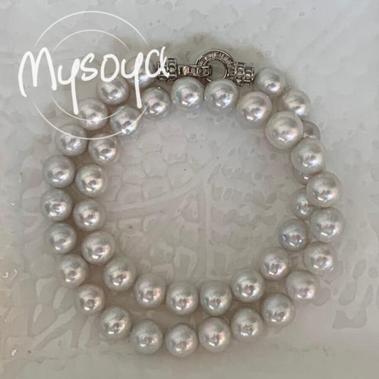 Elevate your style with the MYSOYA Elegant Large Natural White Pearl Necklace, featuring stunning 9-10mm pearls. This necklace comes in an exquisite gift box, making it perfect for any occasion - from daily wear to parties, birthdays, anniversaries