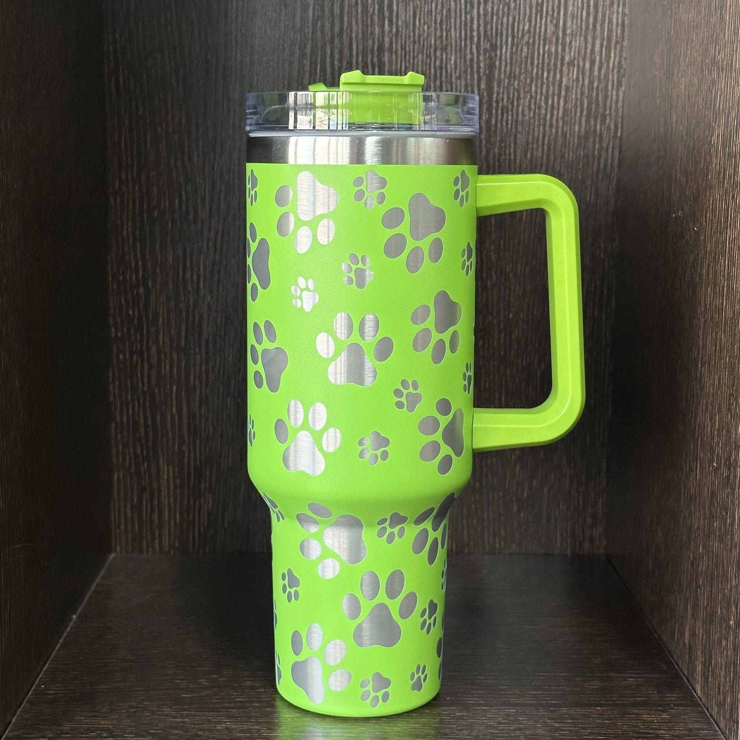 Insulated stainless steel tumbler with cat paw pattern, 40 oz. Double wall vacuum cup with lid and handle. Great for car travel and daily use. Perfect gift for cat lovers.