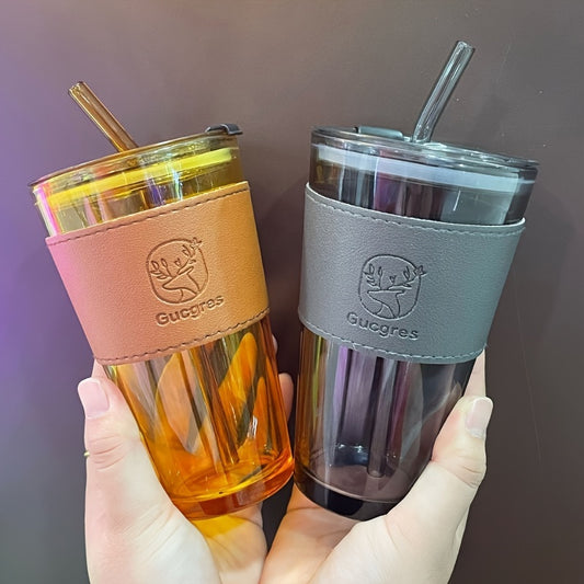 Stylish bamboo-inspired glass mug with straw, ideal for coffee and milk tea