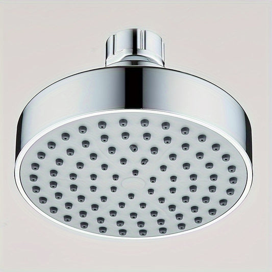 Wall-mounted high-pressure round rainfall shower head made of painted plastic.