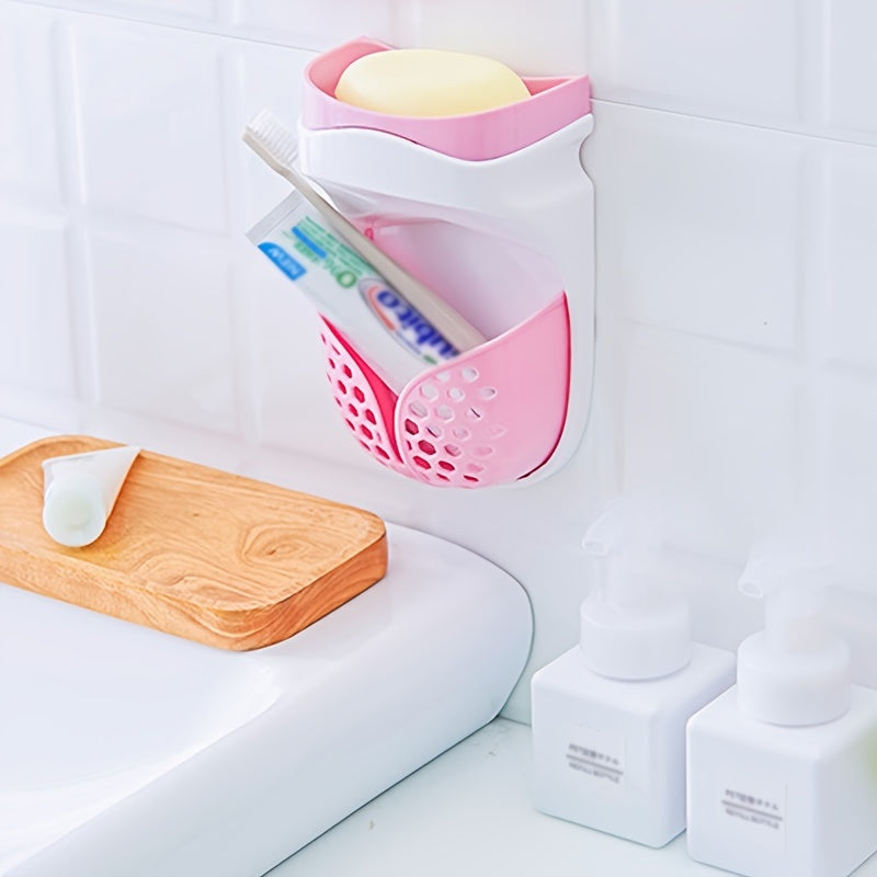 Wall-mounted soap dish with strong adhesive and double-layer design. No-drill drainage system for bathroom and kitchen storage. Features a creative suction cup and soap box.