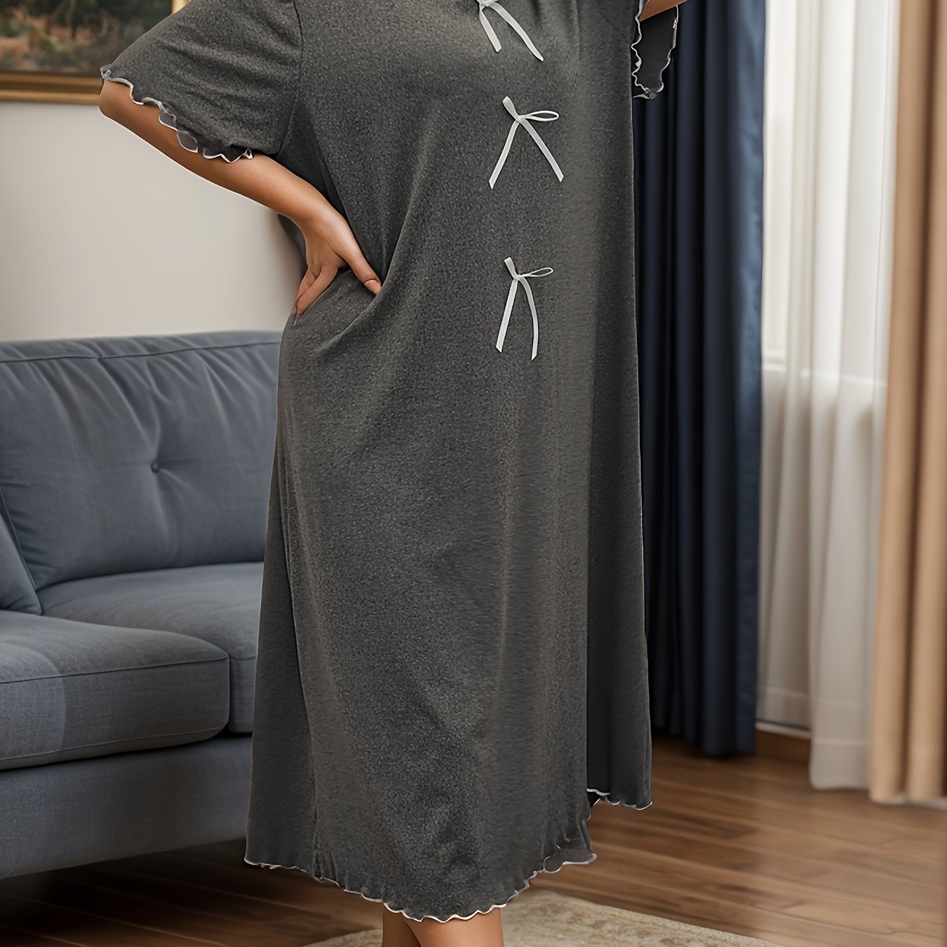 Plus size casual sleep dress with bow decor and short sleeves.