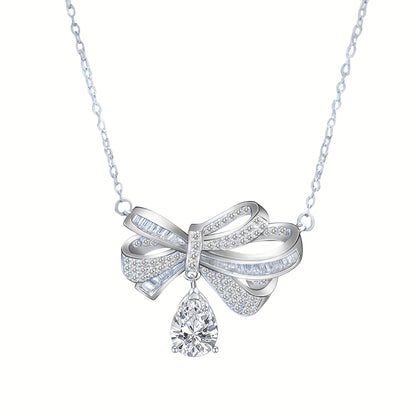 This elegant pendant necklace features 2.0 carats of moissanite in a teardrop tassel bow design, crafted in pure S925 silver. It is a high-end fashion accessory perfect for everyday wear, with its simple and elegant design suitable for parties and as a