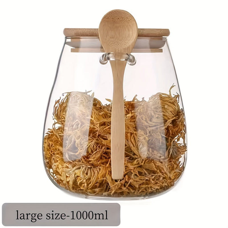 Introducing a single glass jar with a bamboo lid, designed with a wide opening and leak-proof features. This jar includes a spoon and can be reused. Perfect for storing coffee beans, tea, grains, dried fruits, and more. Available in three sizes