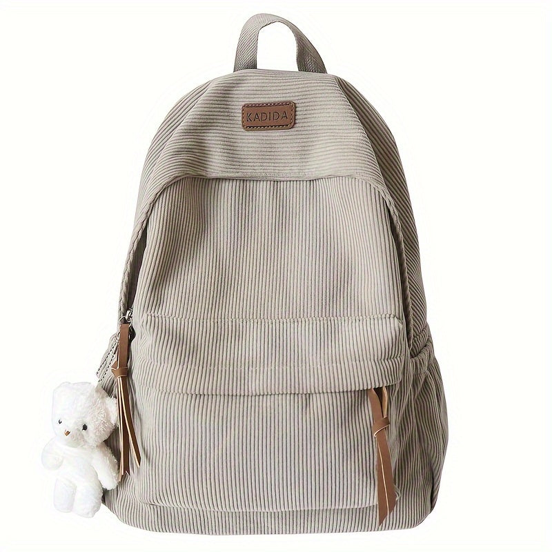 Large capacity women's corduroy backpack with cute bear pendant, ideal for high school and junior high.