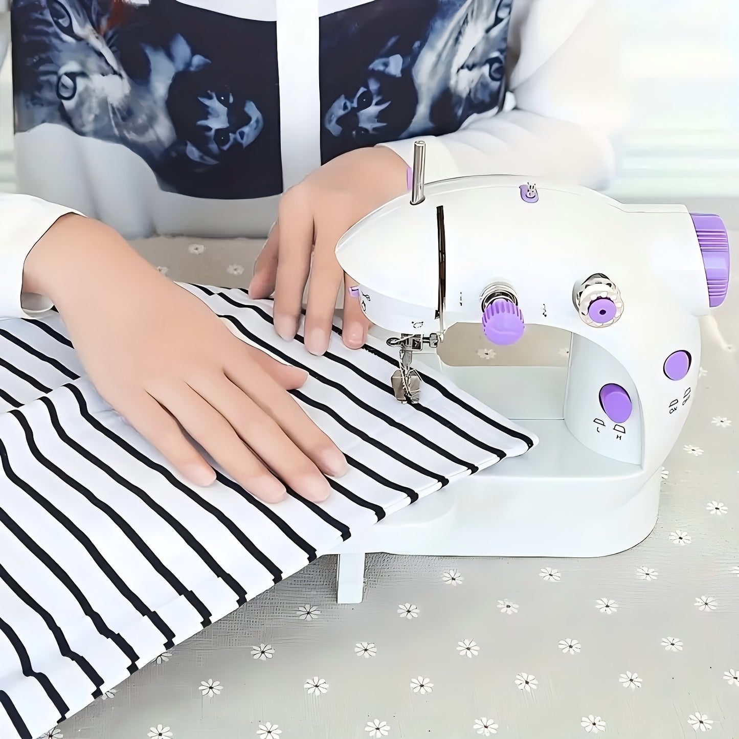 MOOYE Mini Electric Sewing Machine in White with Purple Accents, European Voltage. Includes Accessories and Beginner Crafting Tool. Perfect for Home Use.