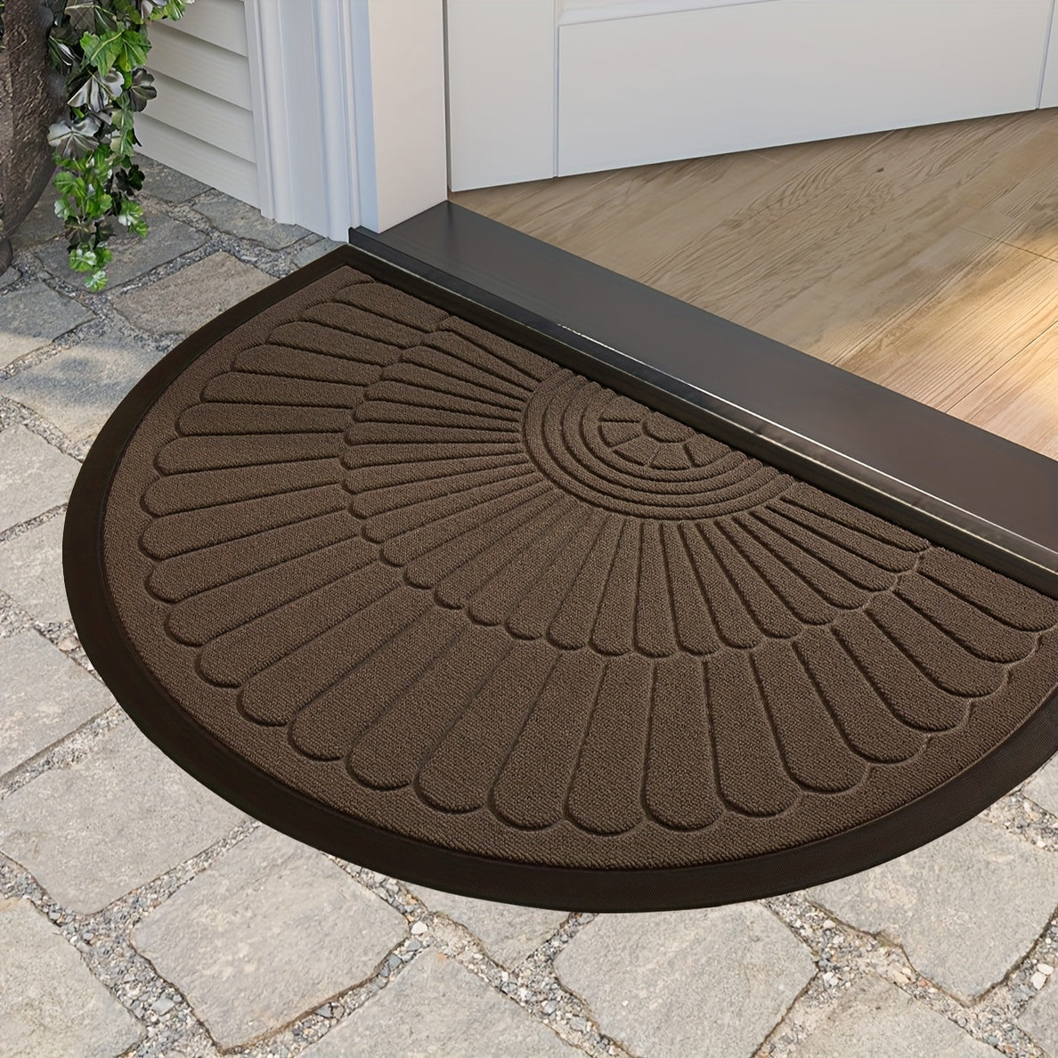 Half circle doormat made of polyester material. Can be used indoors or outdoors. Hand wash only. Ideal for entryway, balcony, patio, garage, and office. Dust-proof and anti-slip.